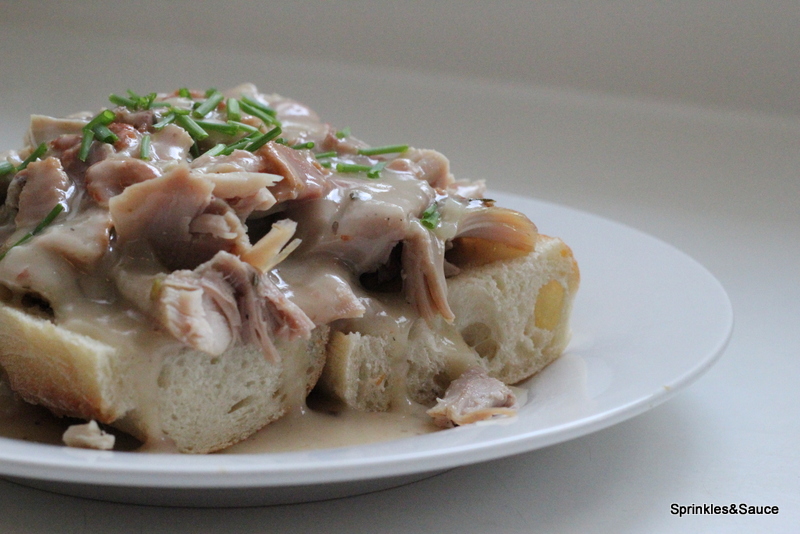 Open Faced Hot Turkey Sandwich Smothered With Turkey And Bacon Gravy Sprinkles And Sauce