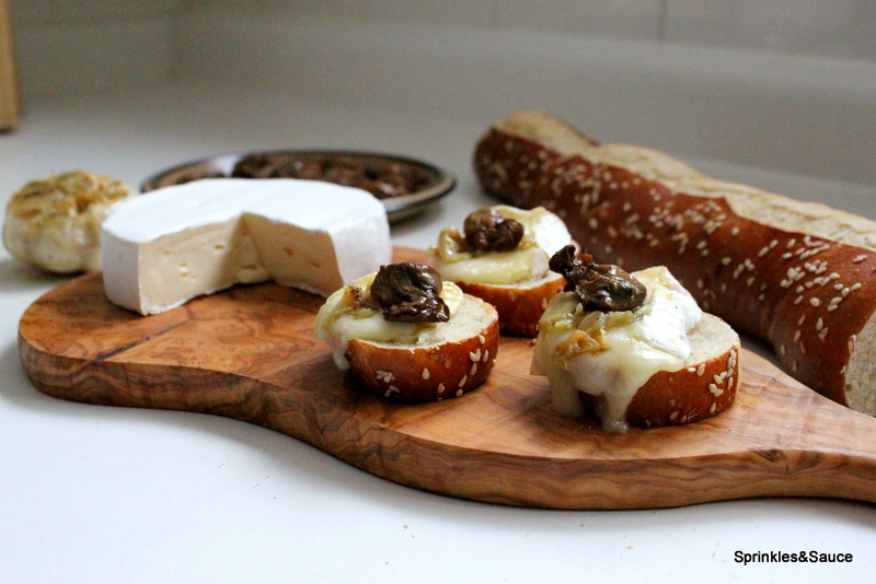 Smoked Oyster and Brie Crostini with Roasted Garlic